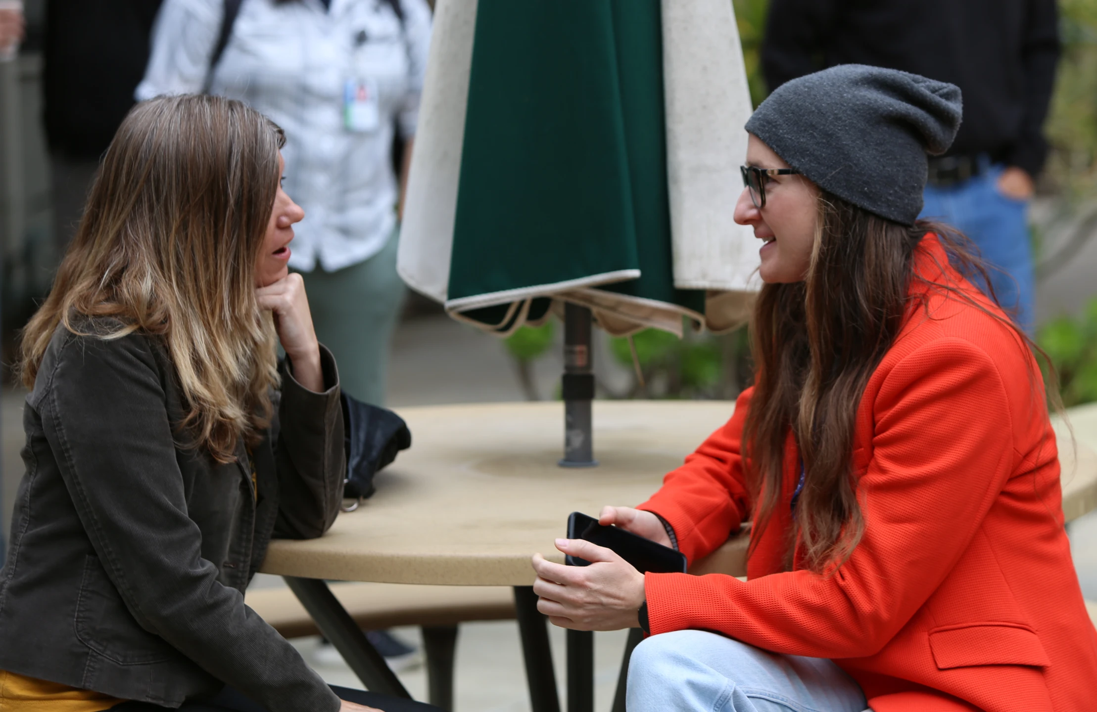 Student talking with an industry professional