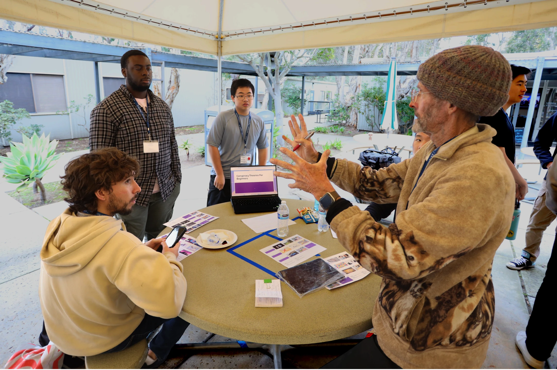 Participants practicing their presenting skills in Slide Deck Roulette