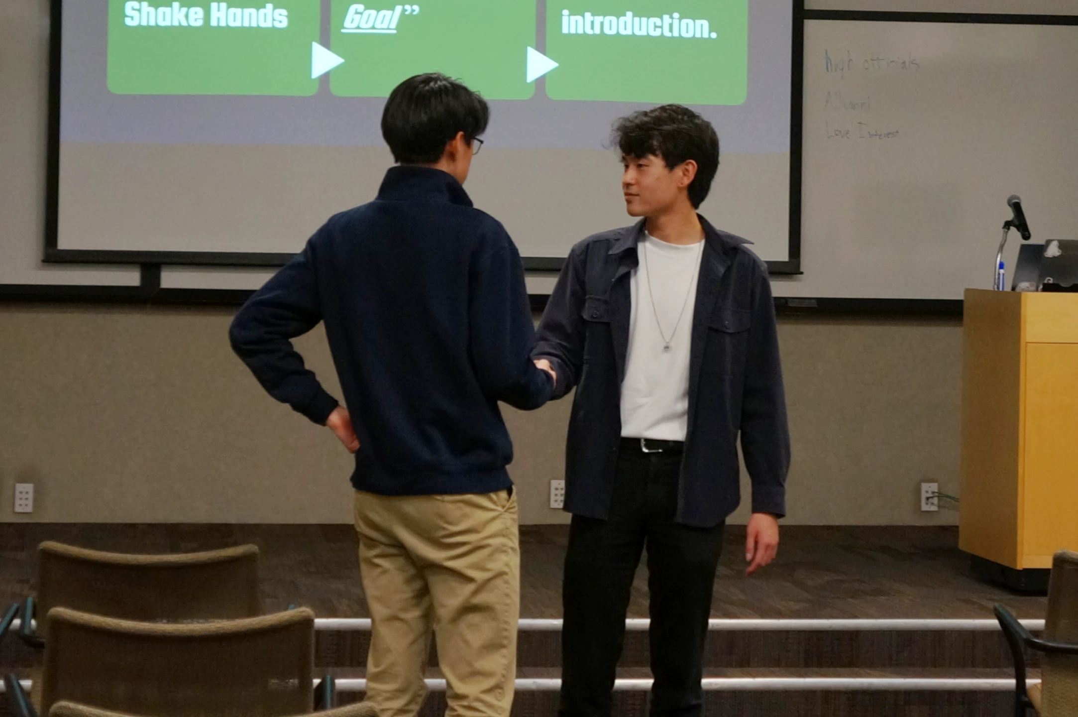 Brandon Shaking Hands with a participant